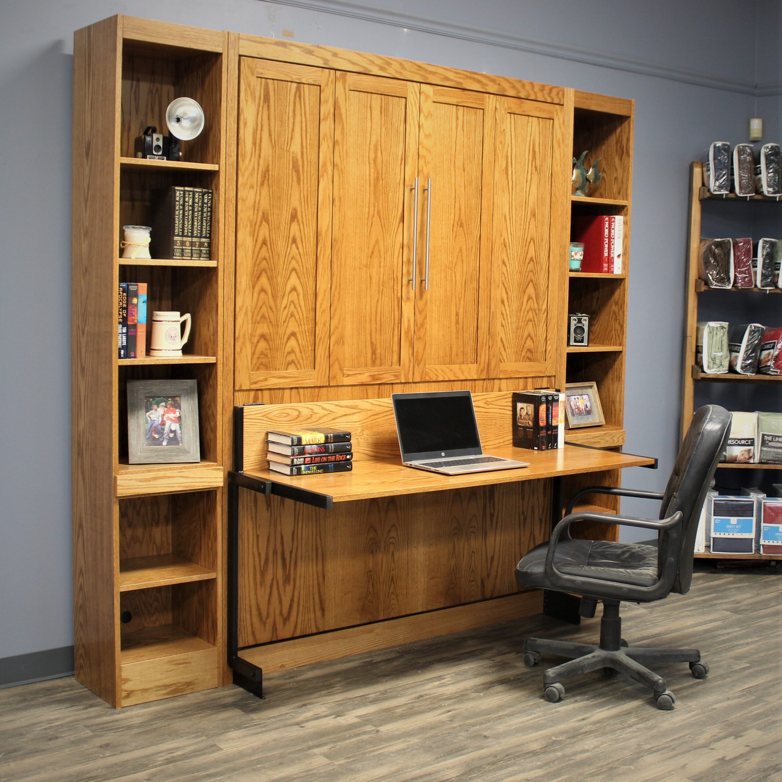 Oak Murphy bed with desk and bookcases
