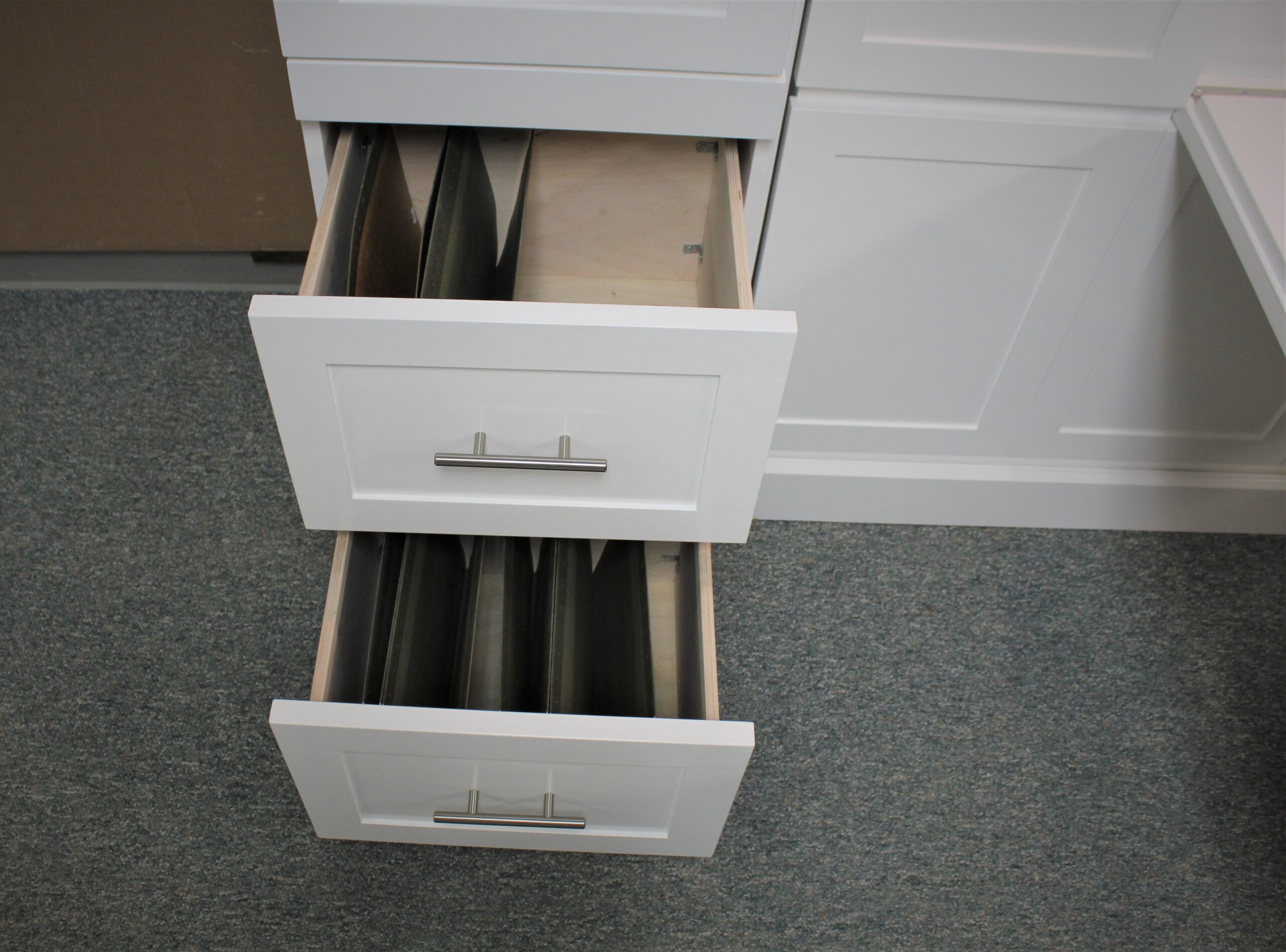 White Christy Murphy bed with hidden desk showing file drawers