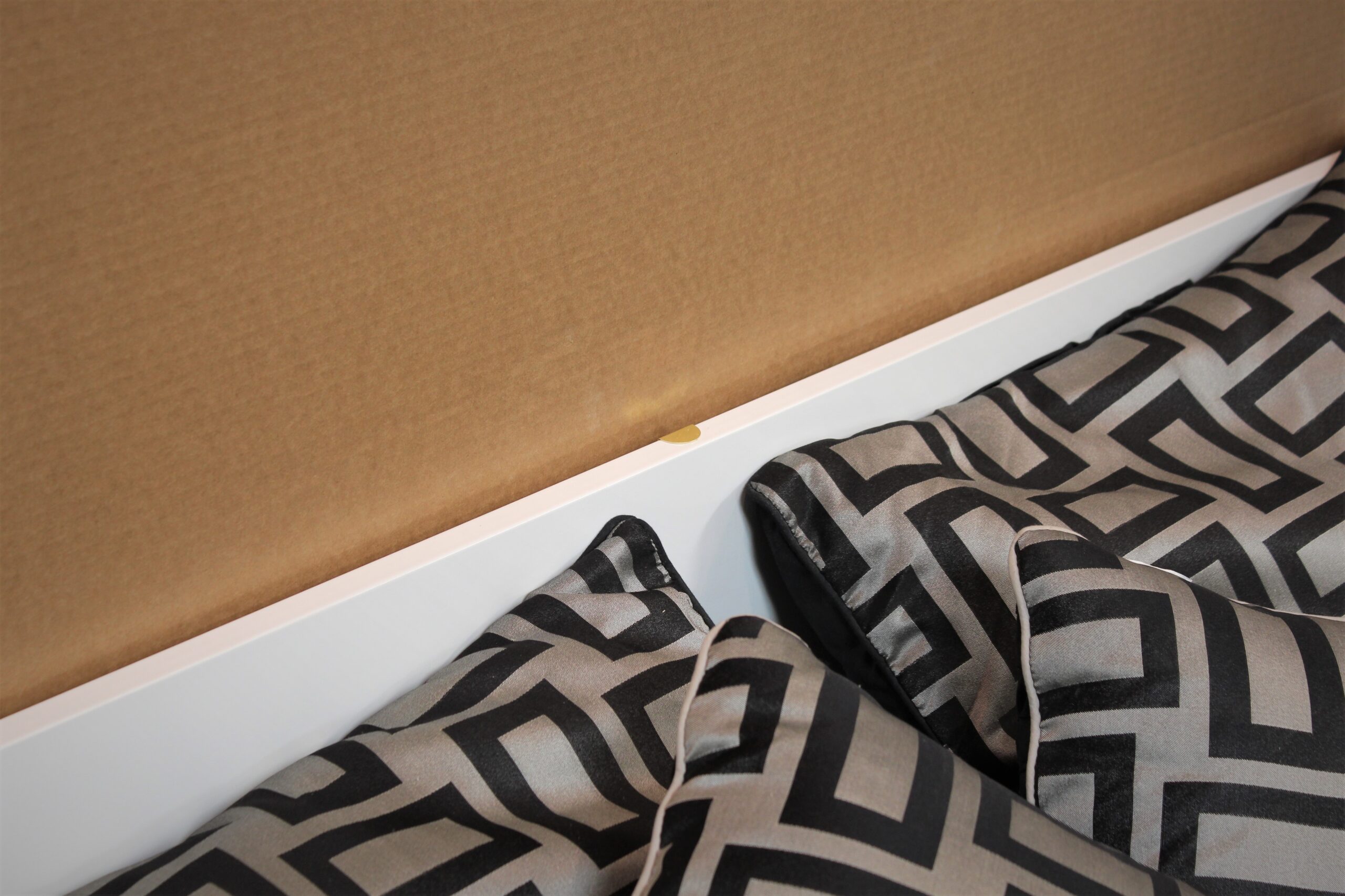 White Christy Murphy bed with hidden desk showing touch dimmer