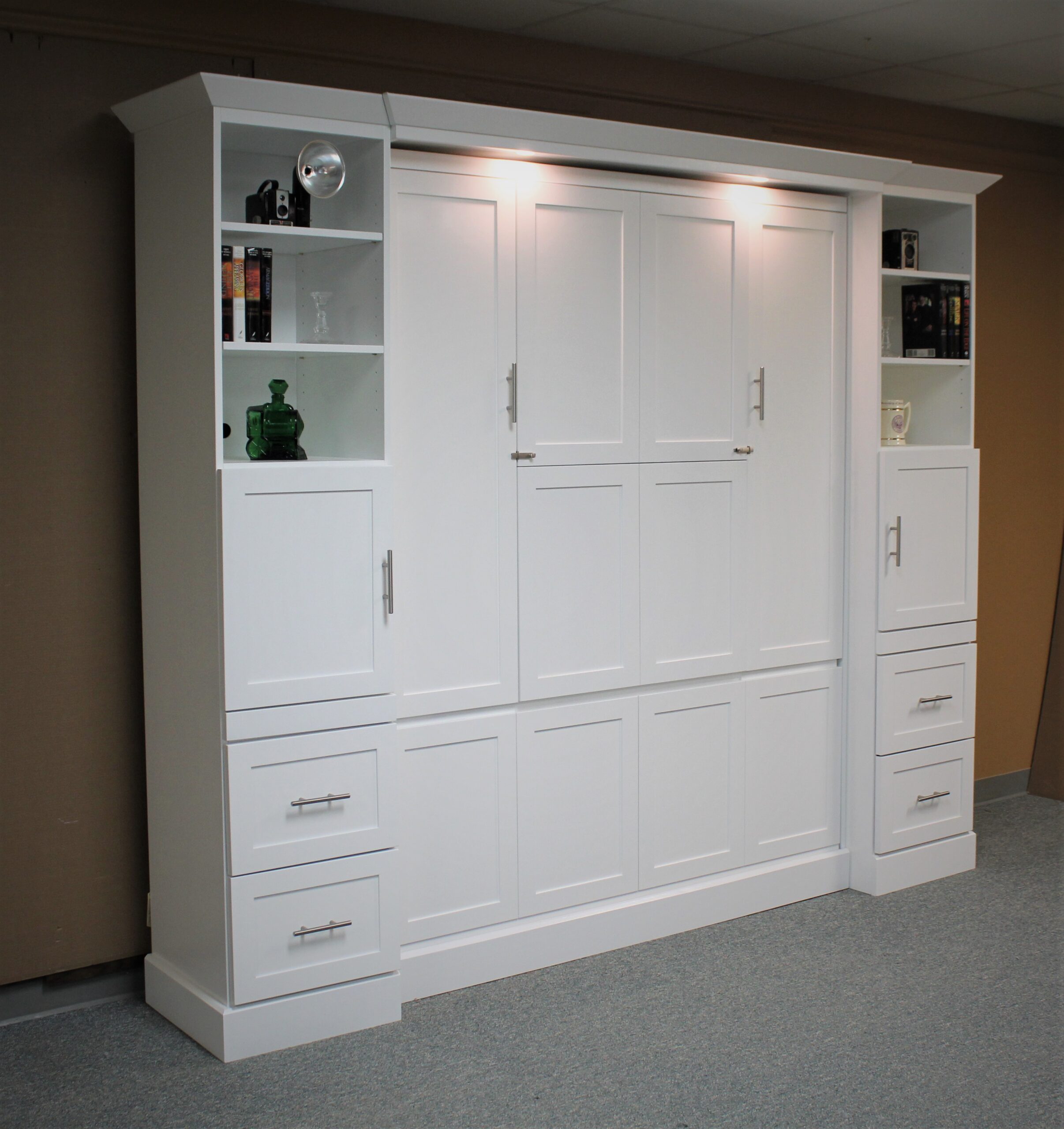 White Christy Murphy bed with hidden desk shown closed