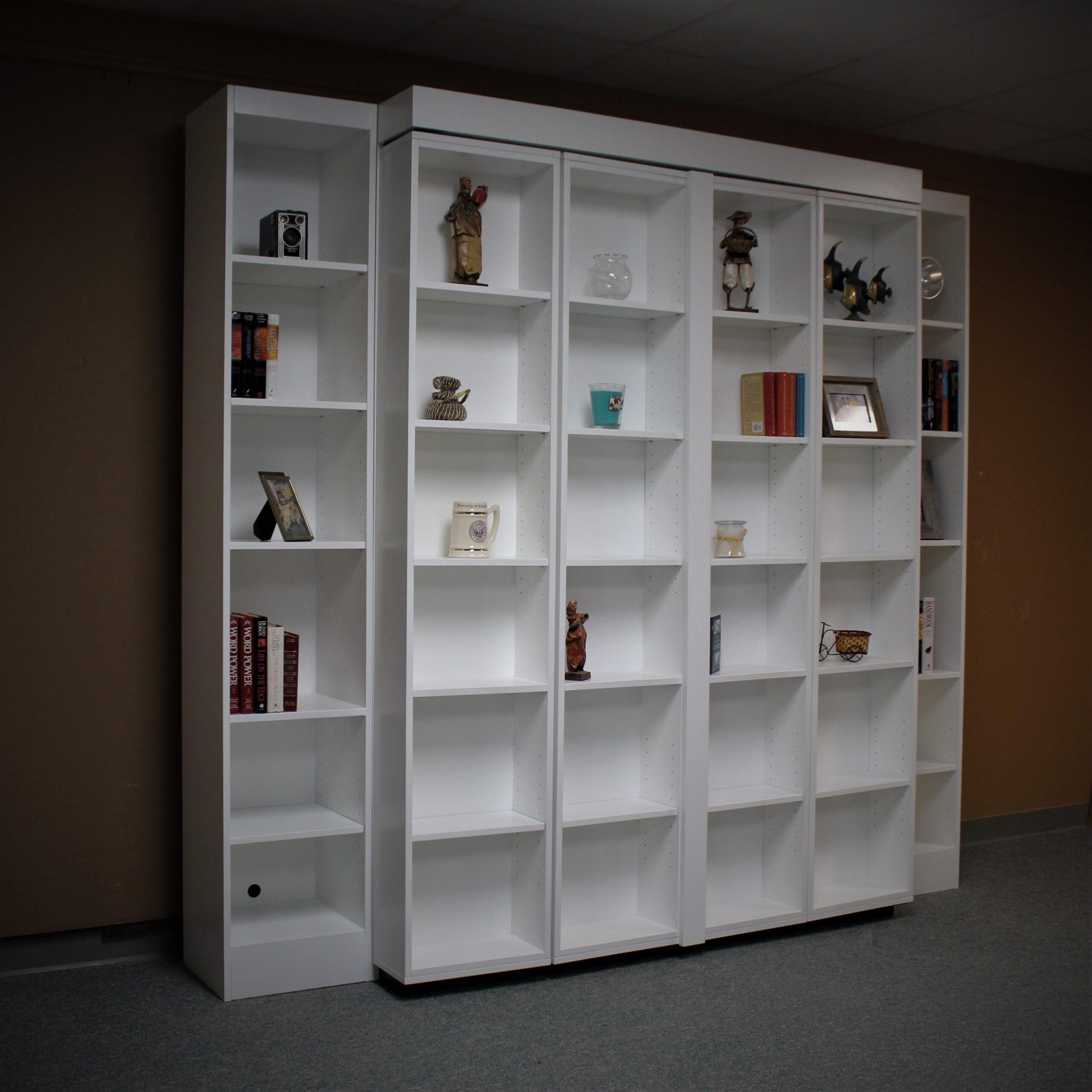 Pivoting Bookcase Murphy Bed Side View of Bookcases Closed