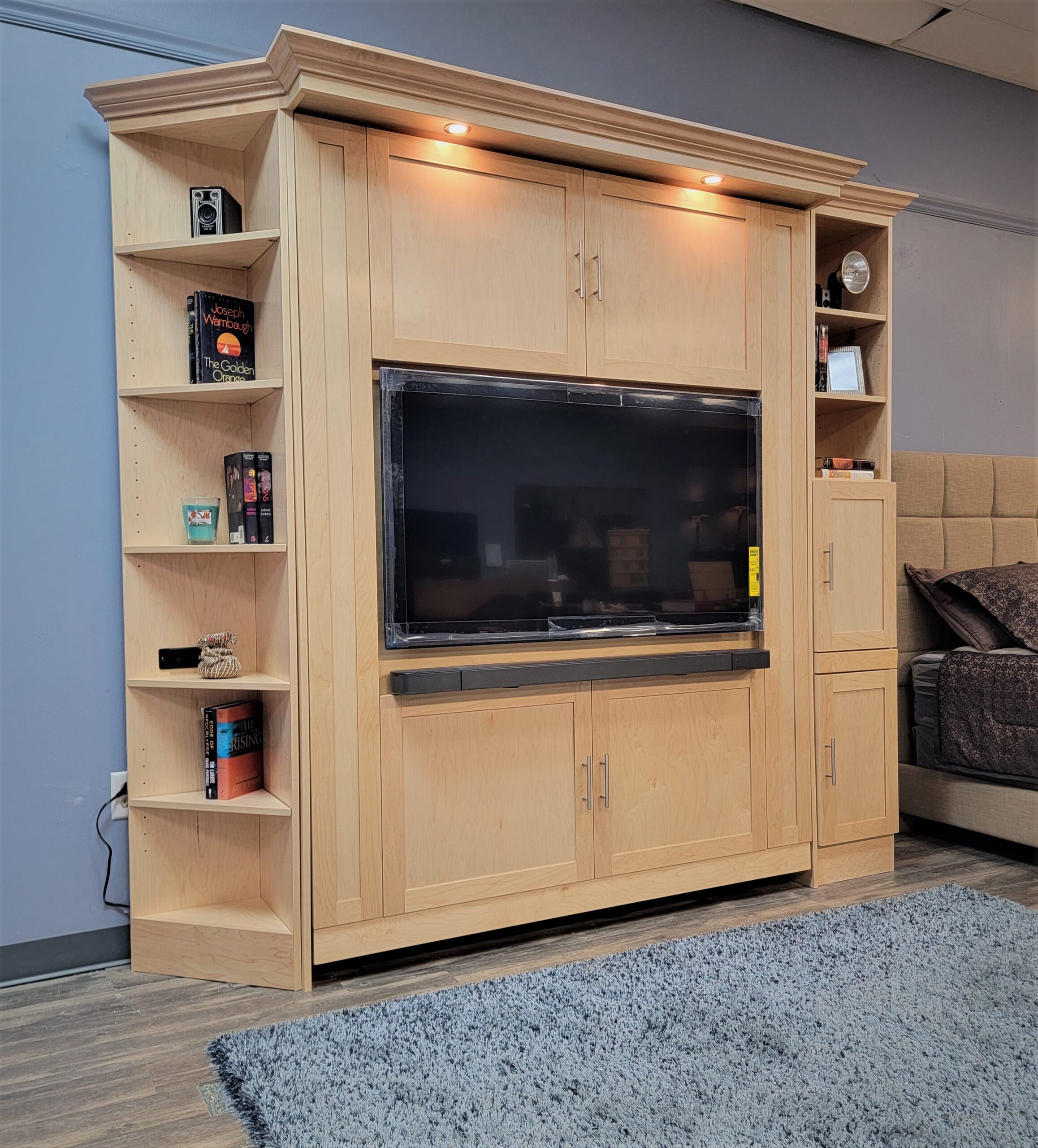 Natural Maple Vertical Entertainment Center Murphy Bed Side View of Murphy Be Shown Closed