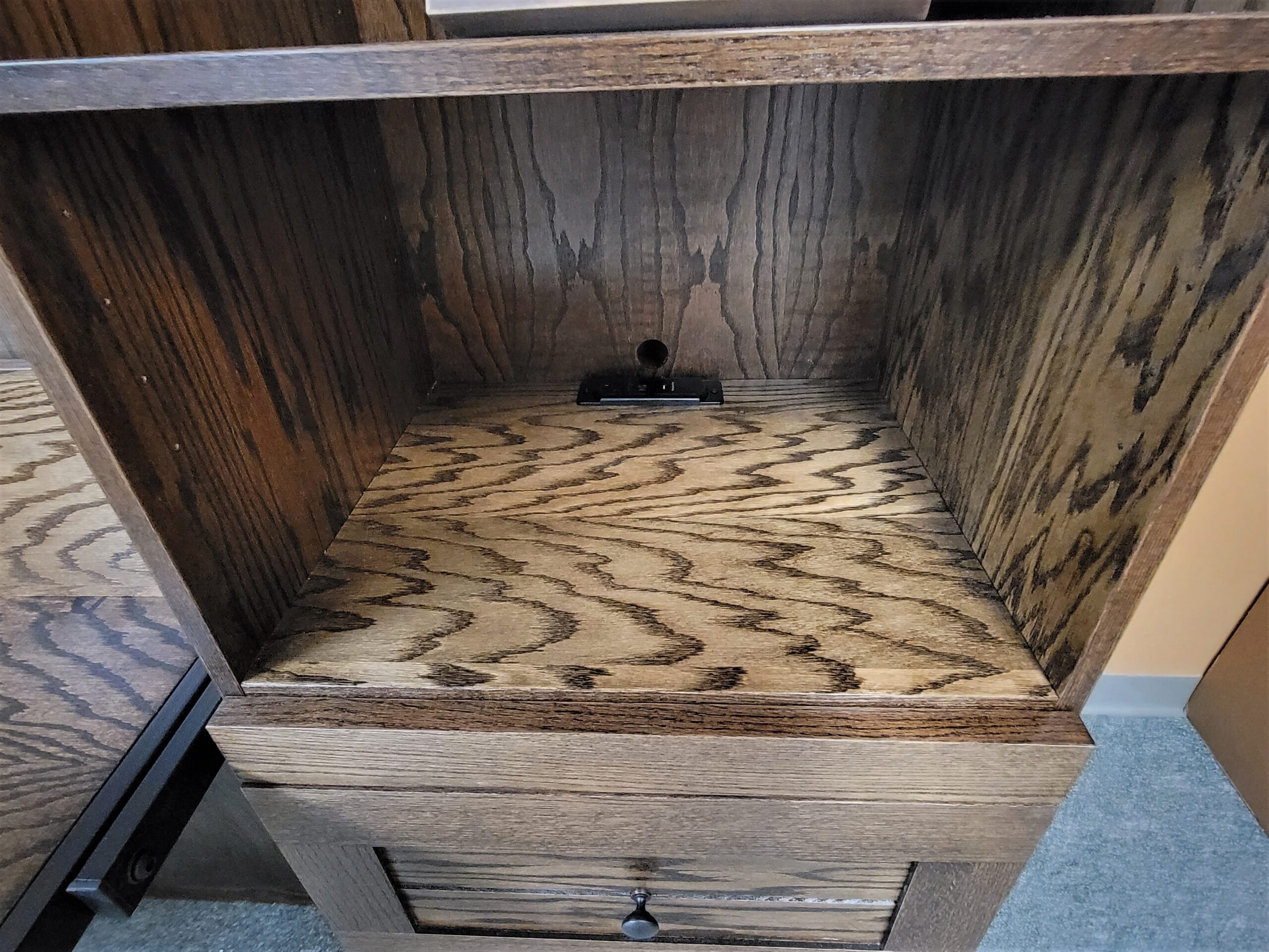 Dark Walnut on Oak Barn Door Murphy Bed Charging Station in Both Bookcases