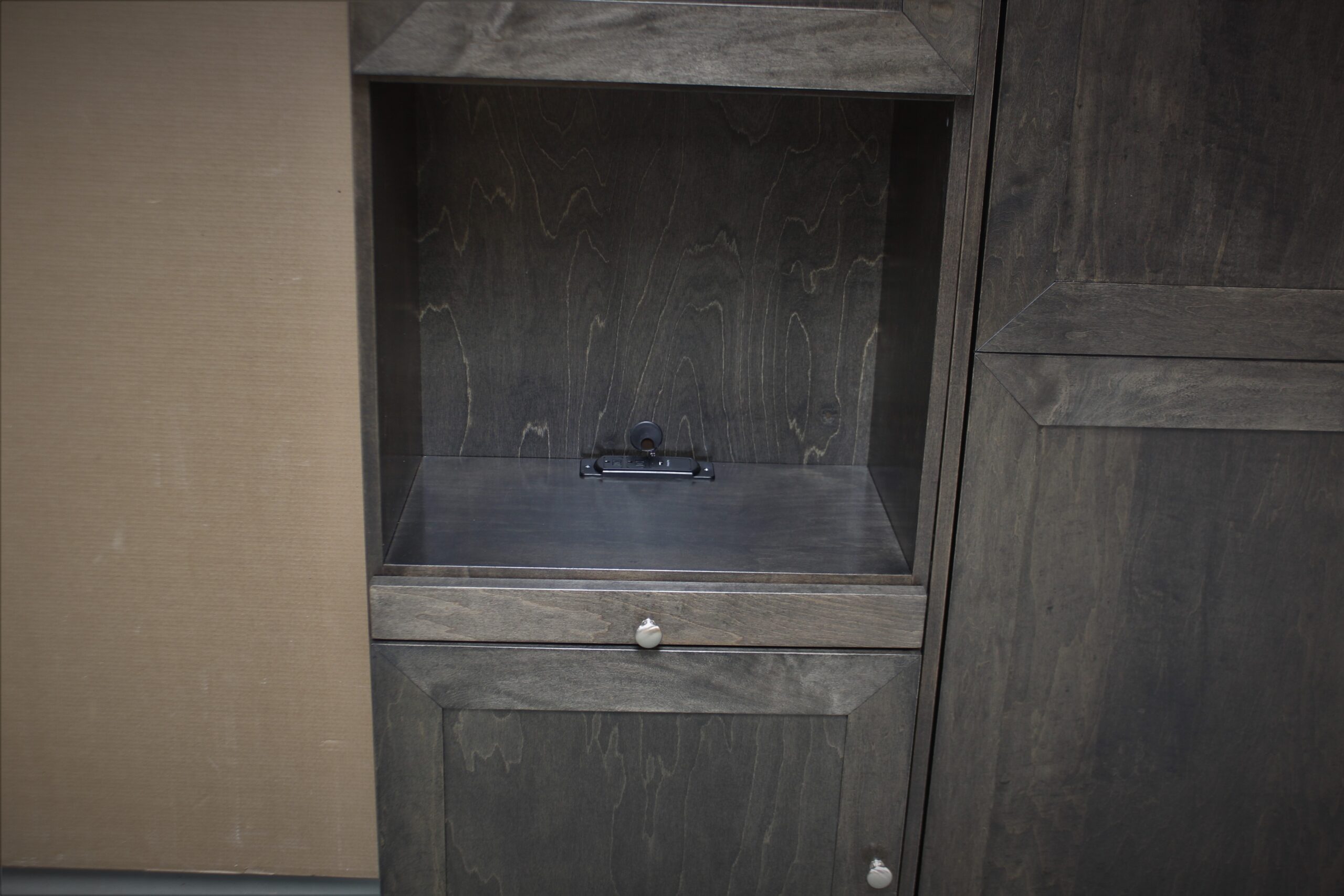 Marriott Murphy Bed Charging Station in Bookcase