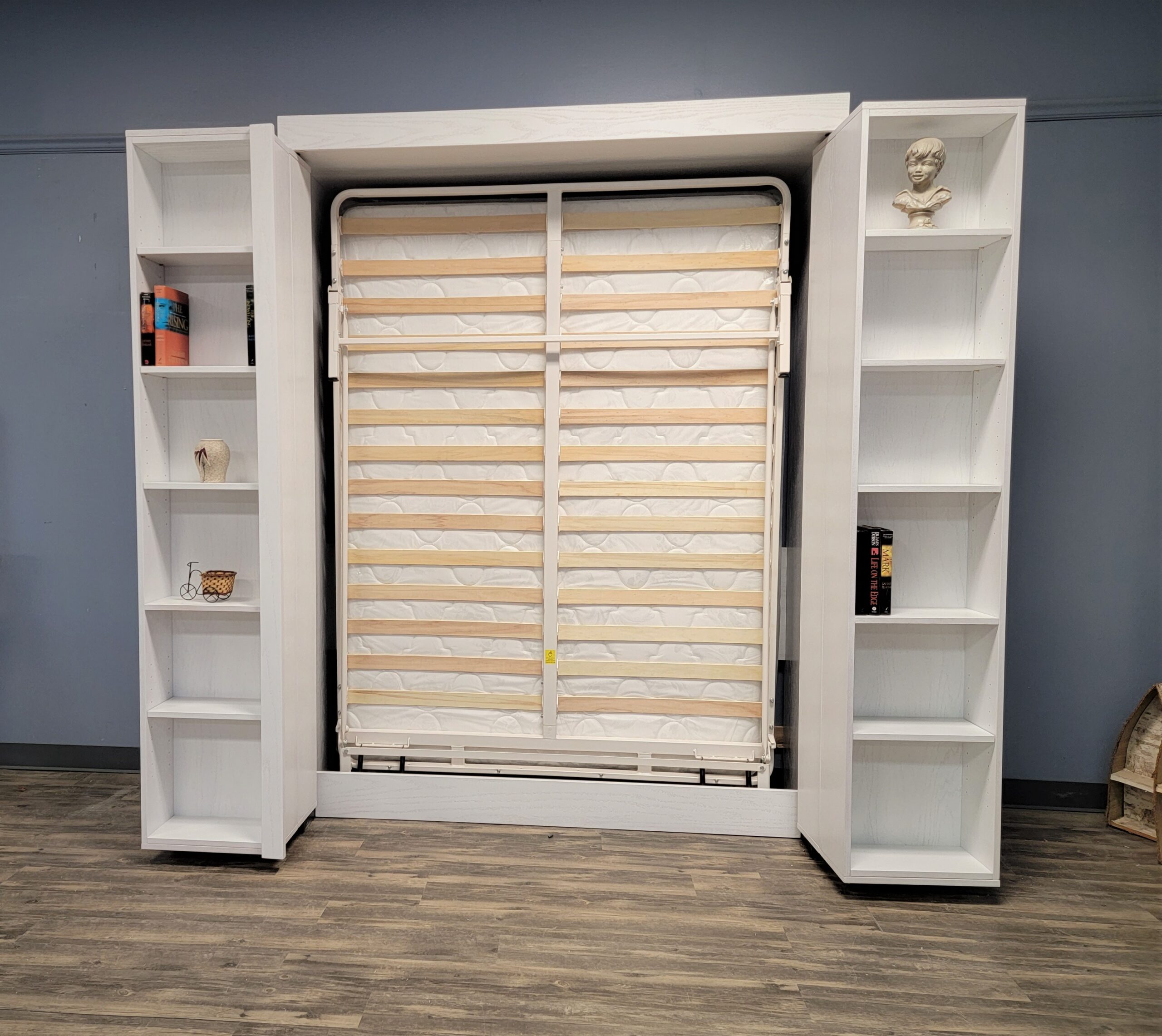 White Lacquer Pivoting Bookcase Murphy Bed Front View of Bed Shown Closed with Bookcases Open
