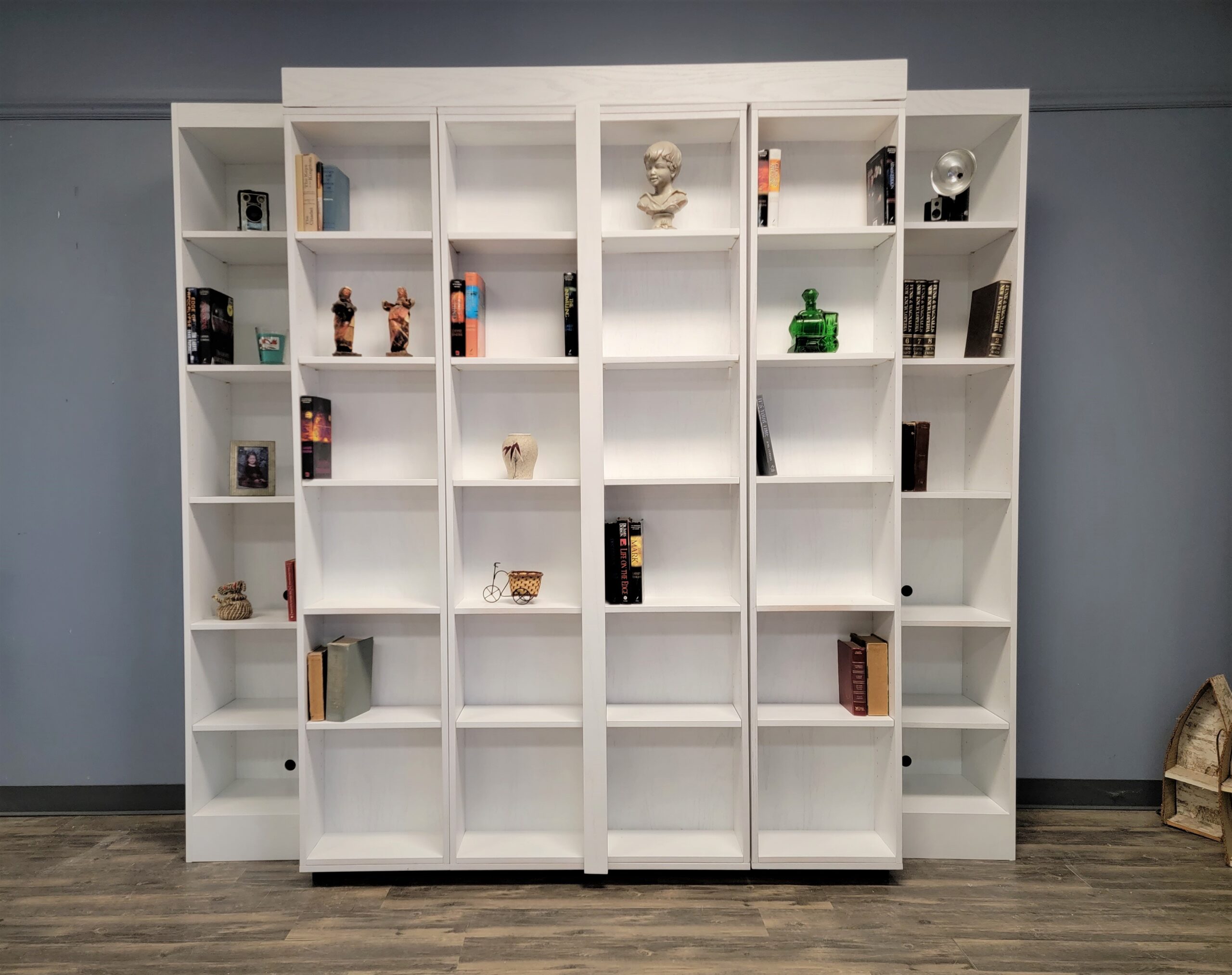 White Lacquer Pivoting Bookcase Murphy Bed Front View of Bed and Bookcases Shown Closed