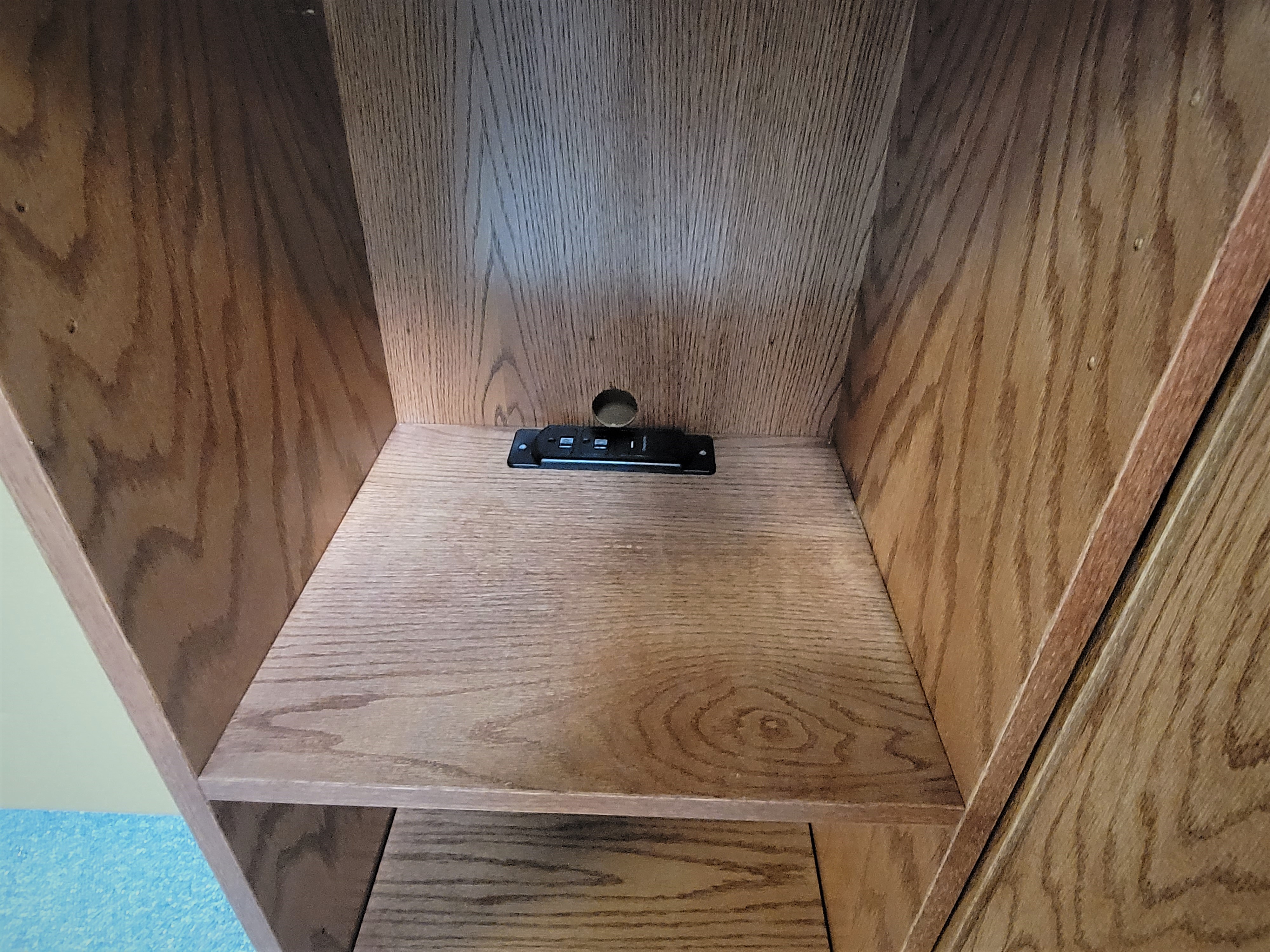 Red Chestnut Pivoting Bookcase Murphy Bed Charging Station in Left Bookcase