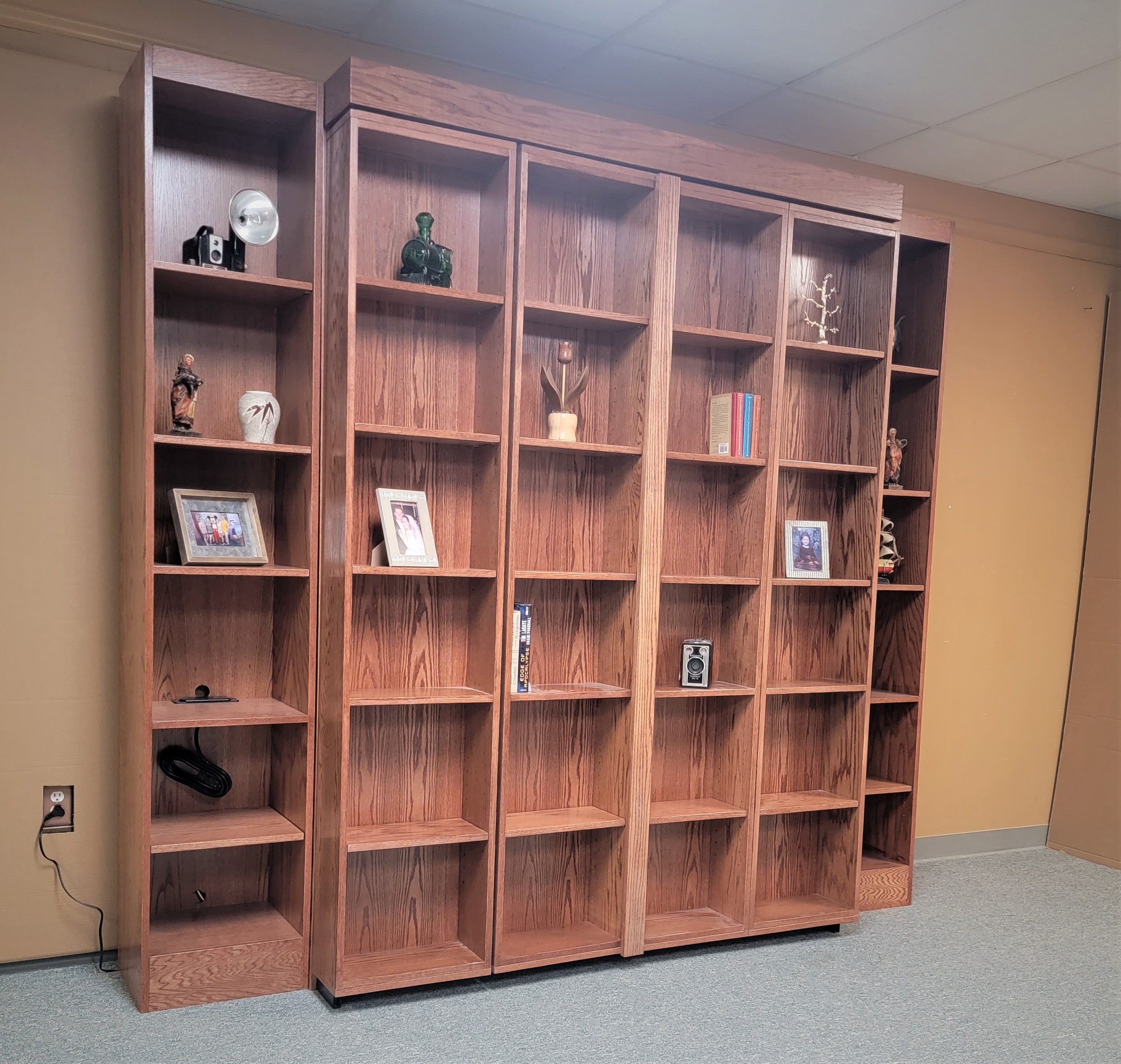 Red Chestnut Pivoting Bookcase Murphy Bed Side View of Murphy Bed Shown Closed